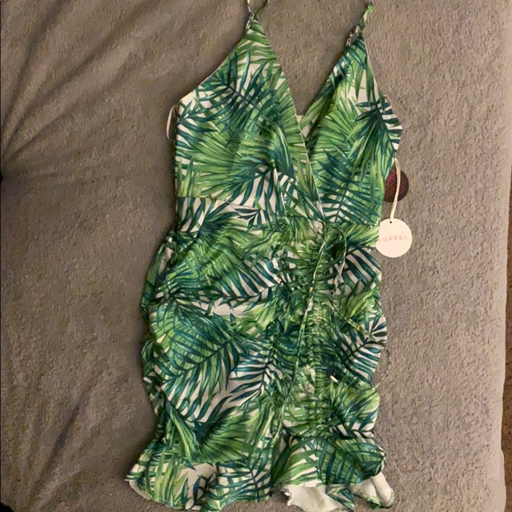 Spaghetti strapped ruched dress.